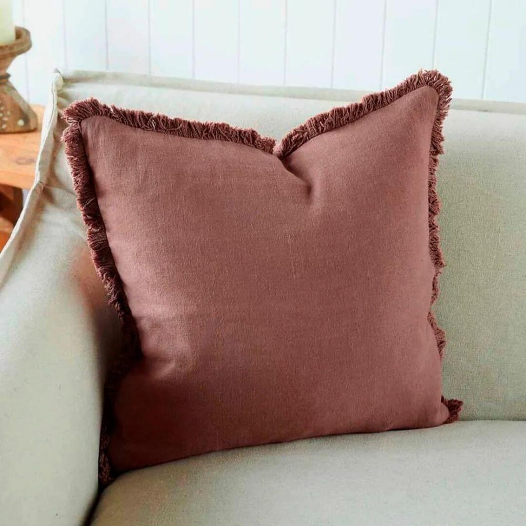 A Desert Rose Red Square 50cm Luca Boho Fringe Cushion to decorate your living room sofa.