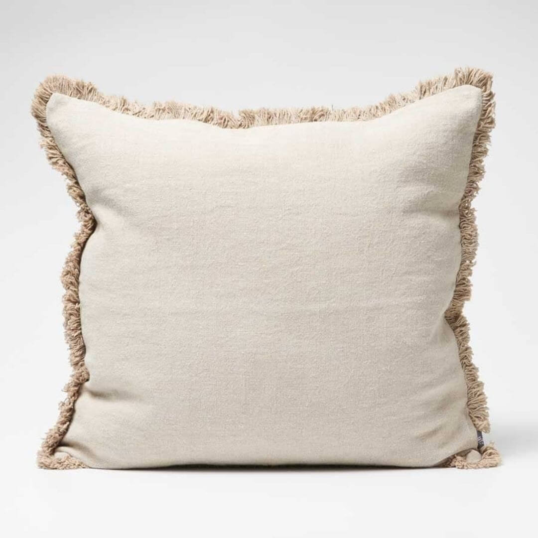 A Square 50cm Luca Boho Fringe Cushion in natural made with quality European linen.