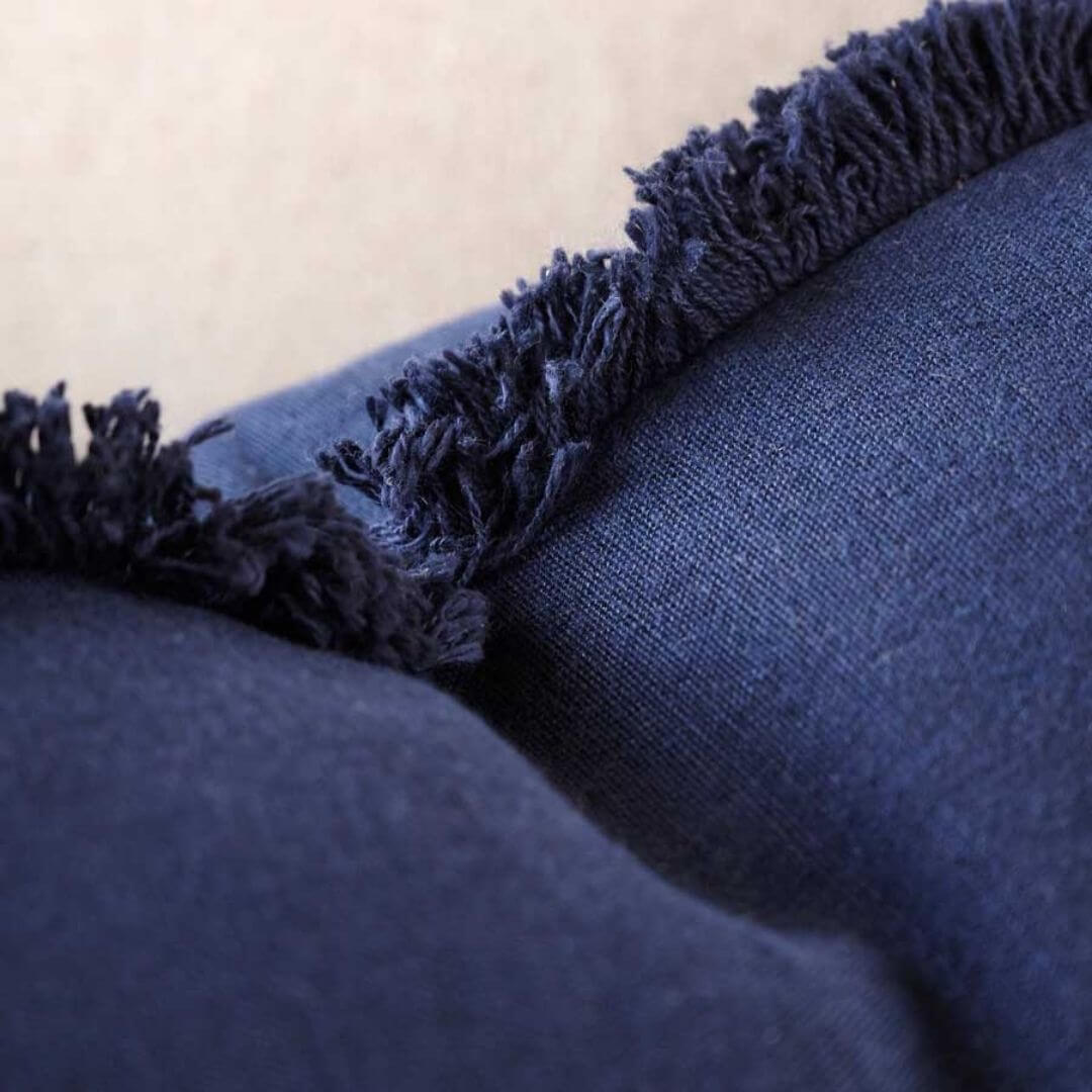 A close up of the edging on the Navy Blue Square 50cm Luca Boho Fringe Cushion
