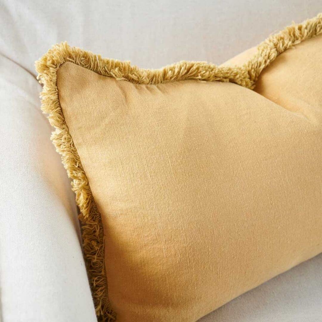 A close up of the Turmeric Yellow Rectangle 40cm x 60cm Luca Boho  Boho Fringe Cushion