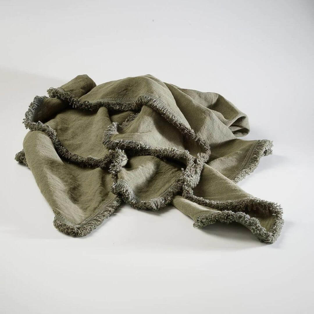 A Khaki Green Rectangle 40cm x 60cm Luca Boho Fringe Linen Cushion and throw bundle set to match