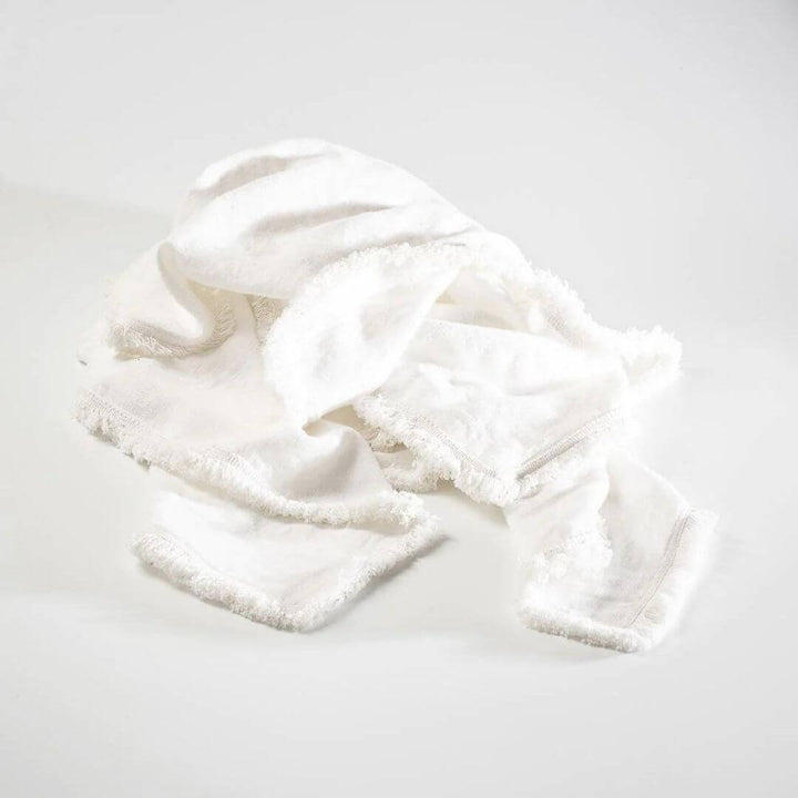 An beautiful off white Luca Boho Fringe Linen Throw measuring 150cm x 200 cm