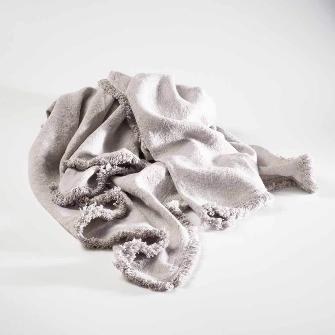 The silver grey Rectangle 40cm x 60cm Luca Boho Fringe Linen Cushion and throw bundle set.
