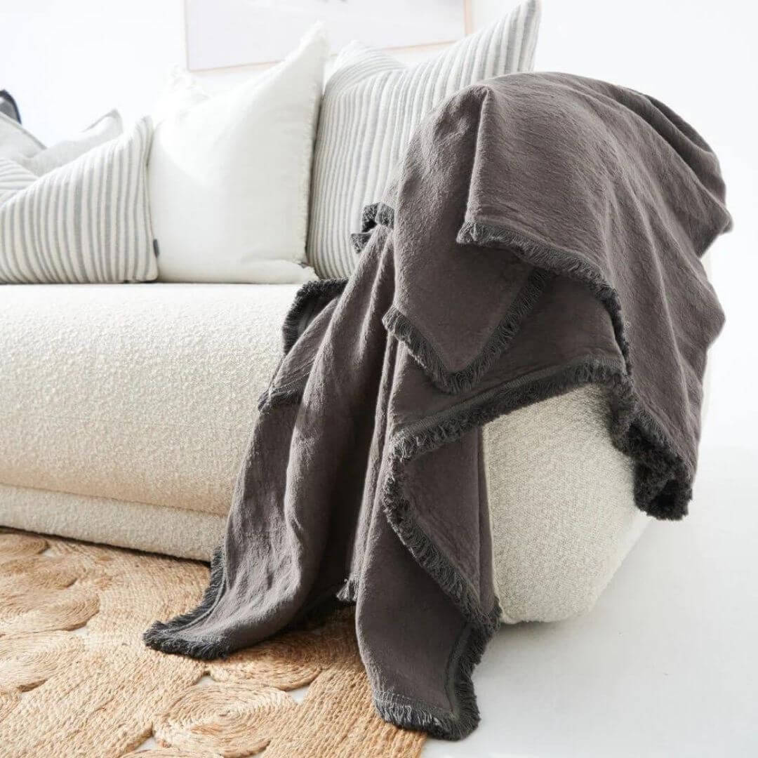 The beautiful Slate Grey Luca Boho Fringe Linen Throw measuring 150cm x 200 cm adds lux layers to your sofa.