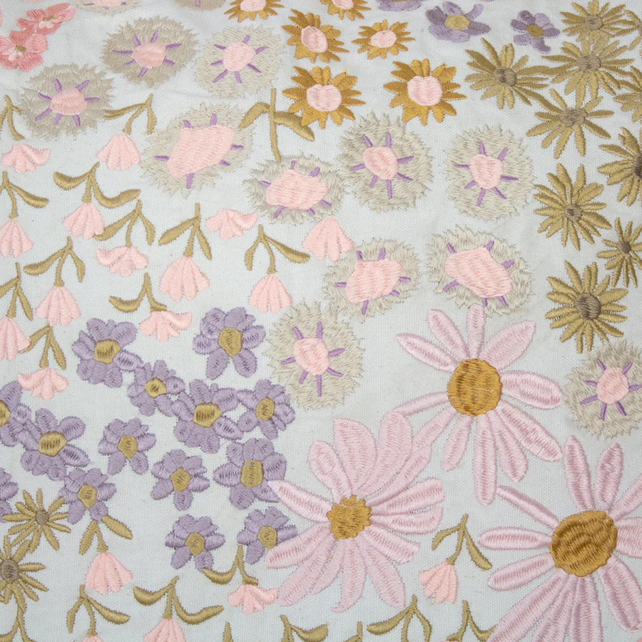 The embroidered floral design in pink, lilac purple, browns and cream on the 50cm Millie Square Scatter Cushion.