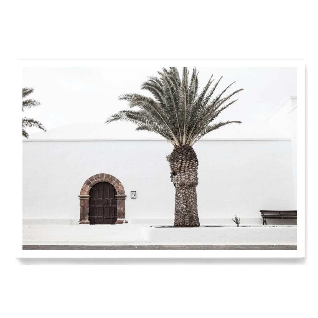 A wall art photo print of a white Spanish Church with a Palm Tree  unframed with a white border by Beautiful HomeDecor