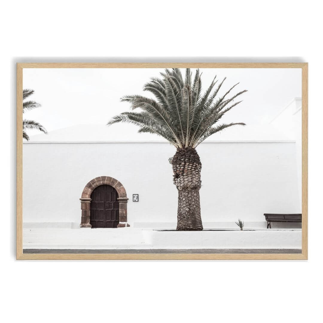 A wall art photo print of a white Spanish Church with a Palm Tree  with a timber frame, no white border at Beautiful HomeDecor
