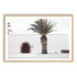 A wall art photo print of a white Spanish Church with a Palm Tree  with a timber frame, white border by Beautiful Home Decor