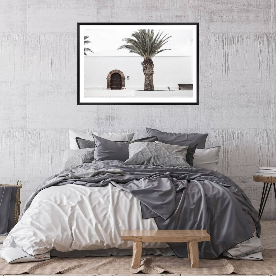 A wall art photo print of a white Spanish Church with a Palm Tree  with a black frame to decorate your bedroom by Beautiful HomeDecor
