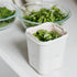 The Strucket Teenie Starter Pack in Light Green and Cool Grey  to clean and store salad and spinach baby leaves