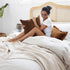 The Tanami Throw in Stone Neutral Brown with a knitted pattern measures 130cm x 200cm to decorate your bedroom bed.