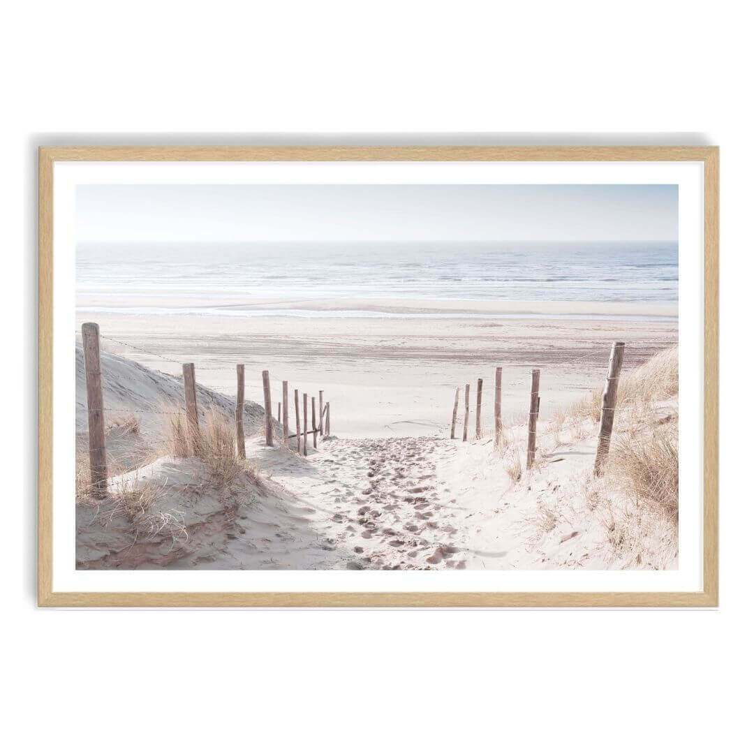 A wall art photo print of a walk on the beach with a timber frame, white border by Beautiful Home Decor