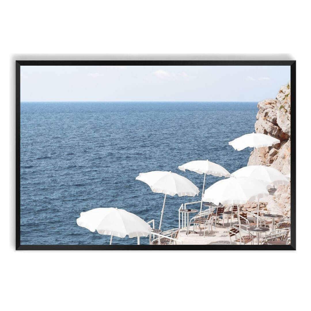 A wall art photo print of white umbrellas on an Amalffi Coast Beach Italy with a black frame, no white border at Beautiful HomeDecor