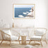 A coastal wall art photo print of white umbrellas on an Amalfi Coast Beach Italy with a timber frame for the living room by Beautiful Home Decor