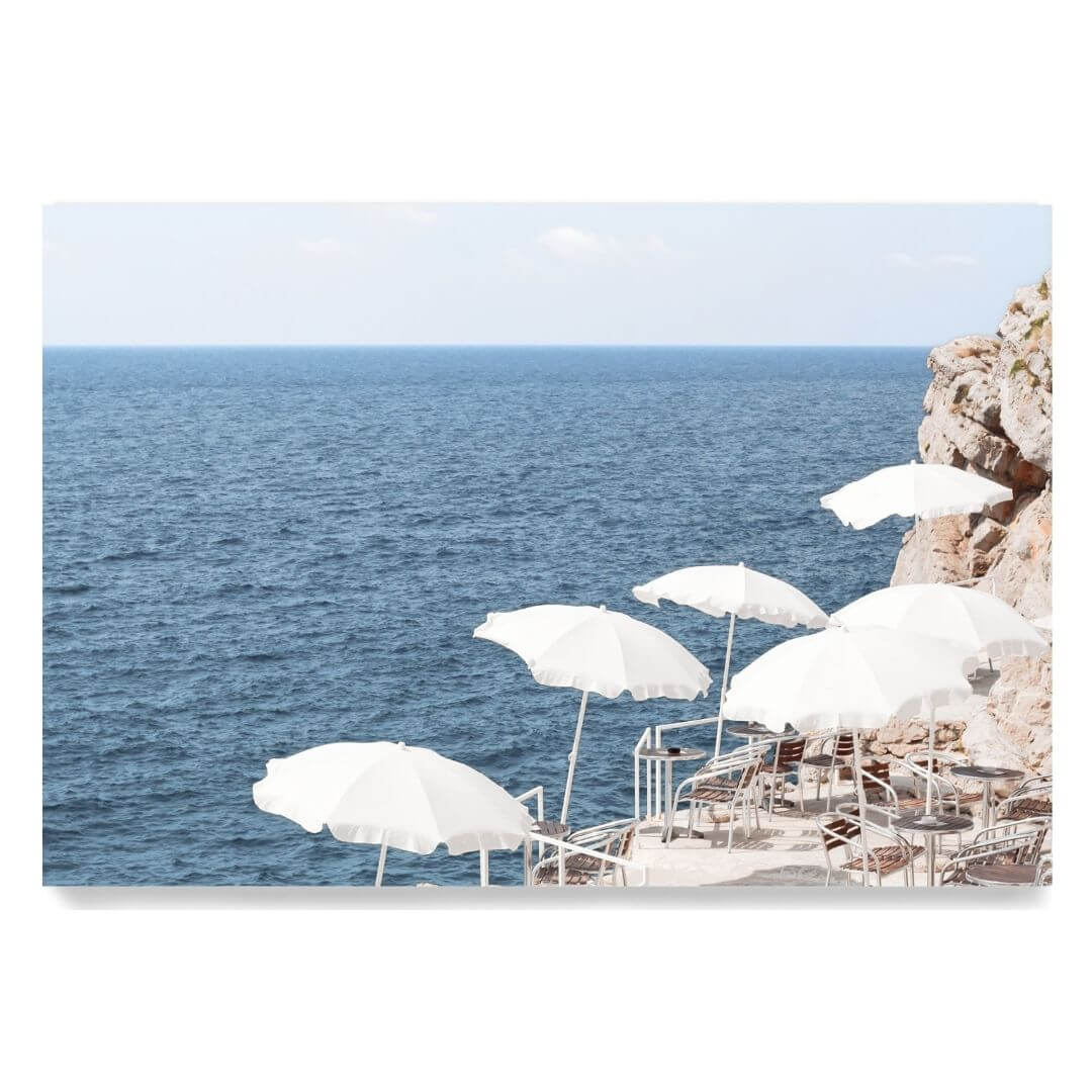 A wall art photo print of white umbrellas on an Amalffi Coast Beach Italy unframed, printed edge to edge without a white border