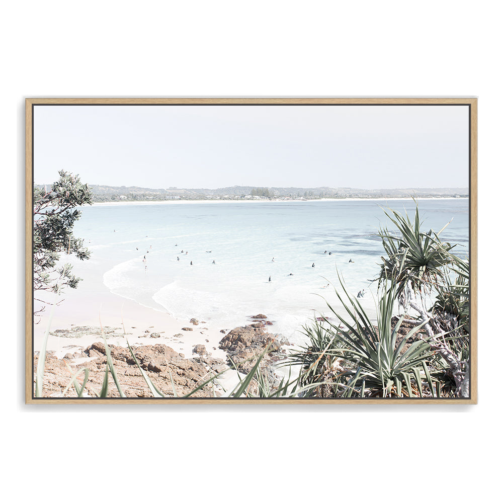 A Hamptons photographic artprint of Watego Beach in Byron Bay featuring surfers in the blue waves, available framed on unframed of Australian Surf Beach B.