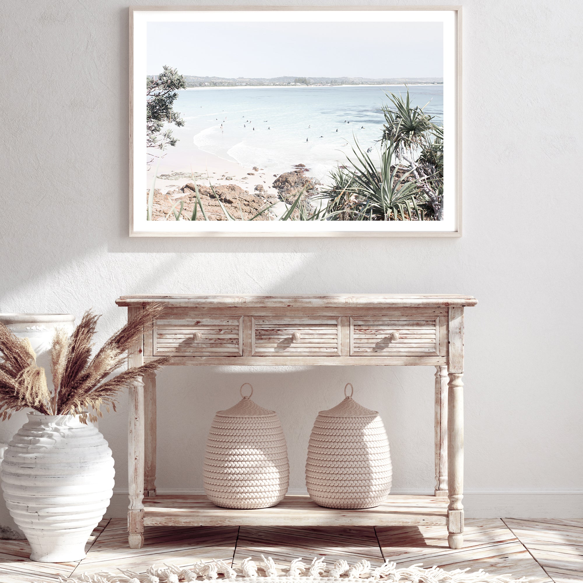 A Hamptons wall art print of Watego Beach in Byron Bay featuring surfers in the blue waves, available in poster print and canvas of Australian Surf Beach B.