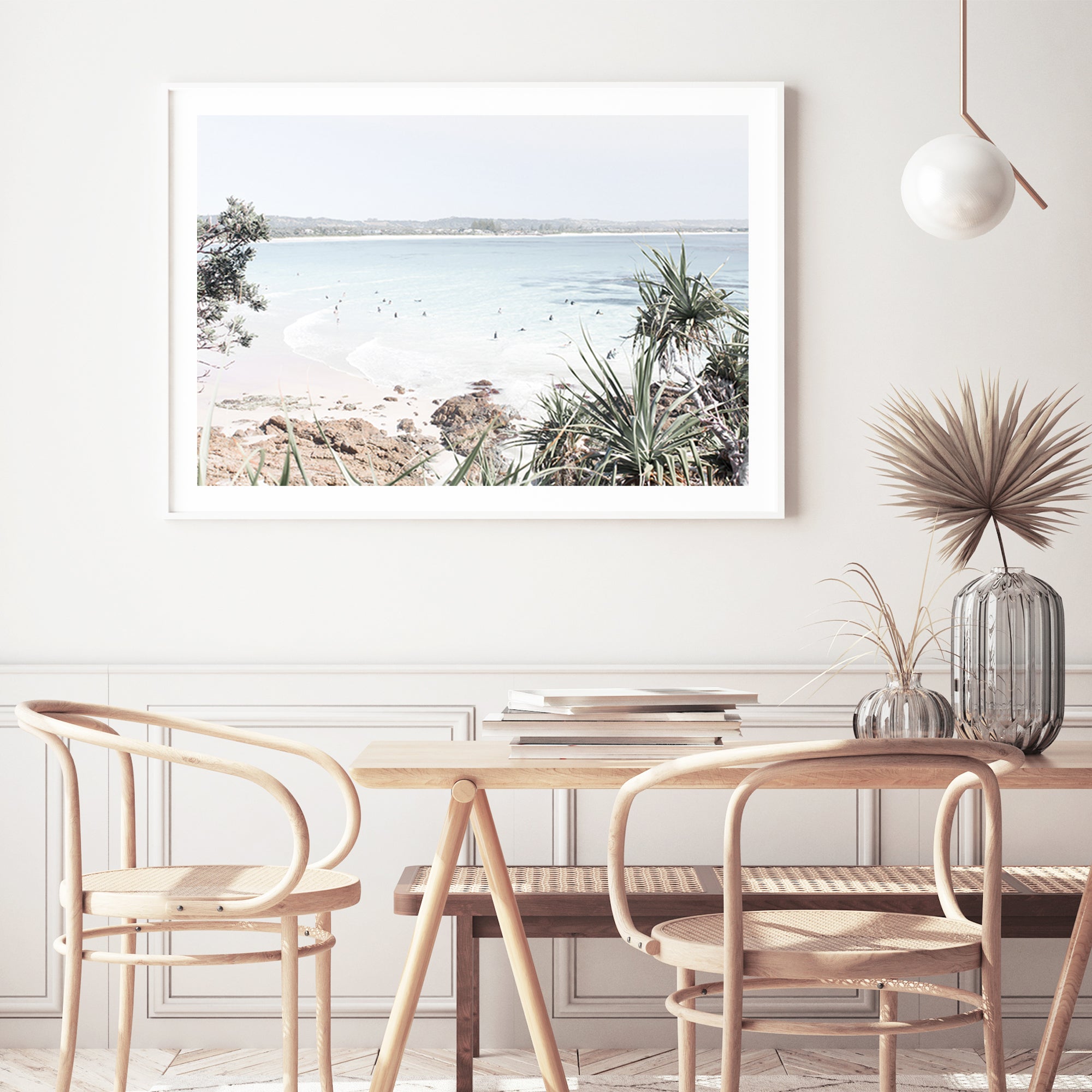 A coastal photo stretched canvas wall art print of Watego Beach in Byron Bay featuring surfers in the blue waves  of Australian Surf Beach B.