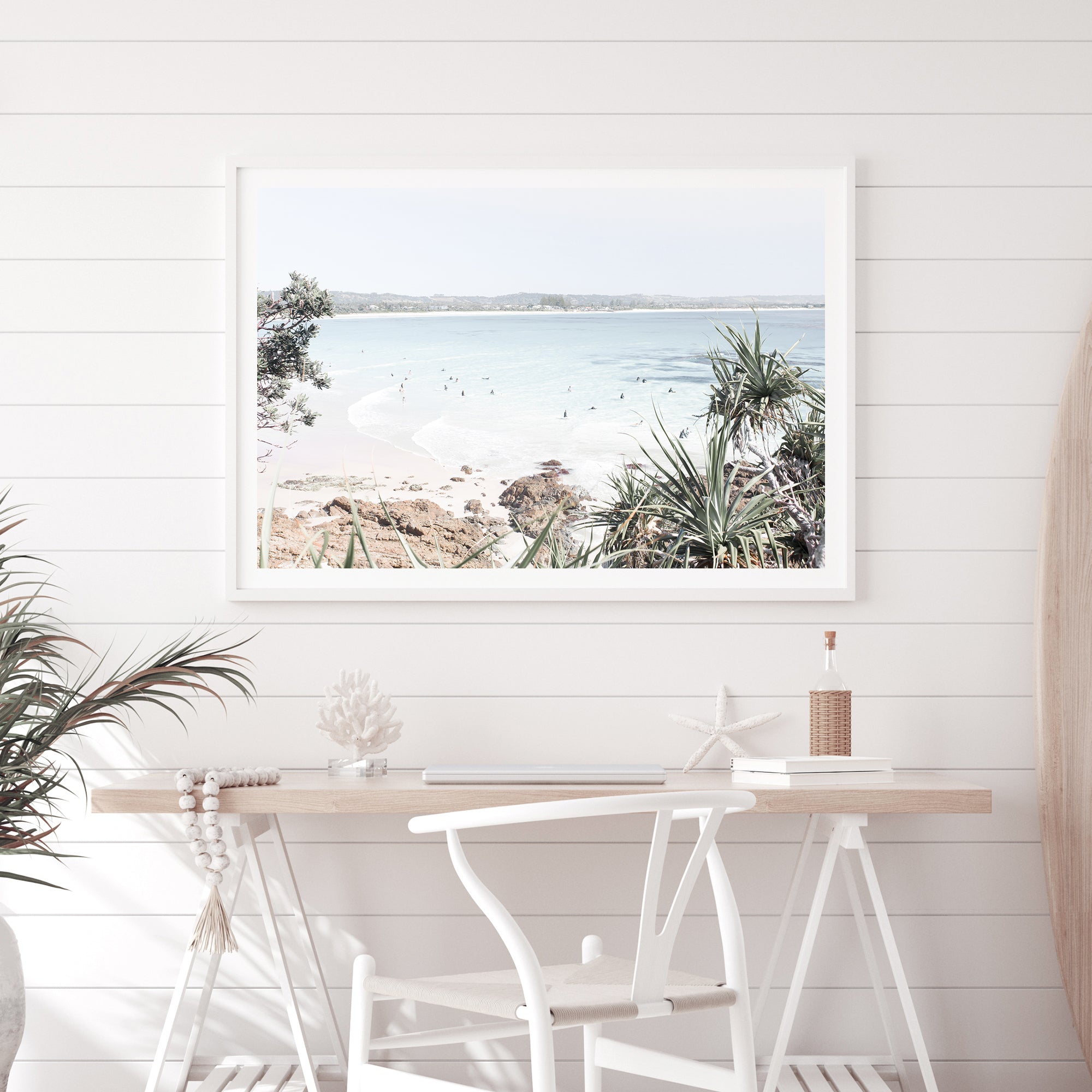 A coastal photographic stretched canvas artprint of Watego Beach in Byron Bay featuring surfers in the blue waves, available framed on unframed  of Australian Surf Beach B.