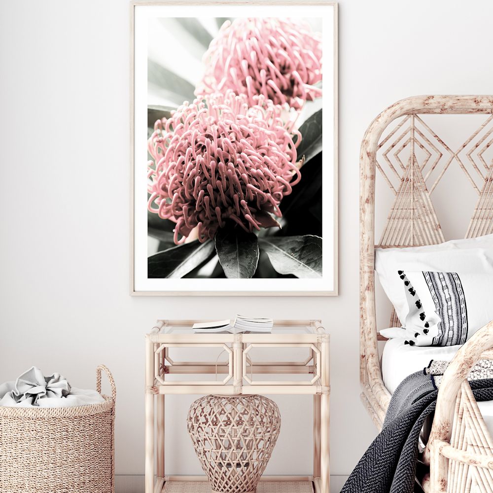 Two beautiful red Australian native Waratah flowers with muted green leaves in the background wall art print, available in an unframed poster print, stretched canvas or with a timber, white or black frame. 