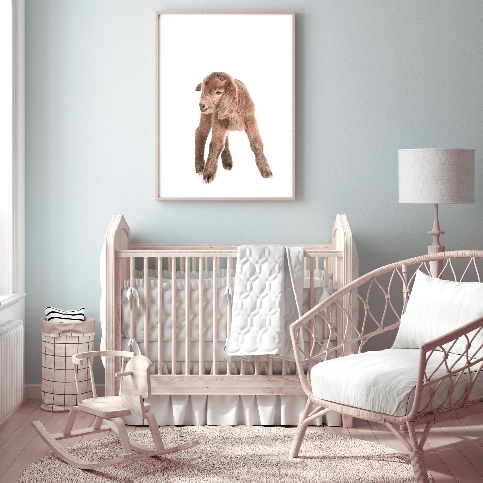 Perfect for your baby nursery, featuring the animal Baby Goat photo art print, available in an unframed poster print, stretched canvas or with a timber, white or black frame.