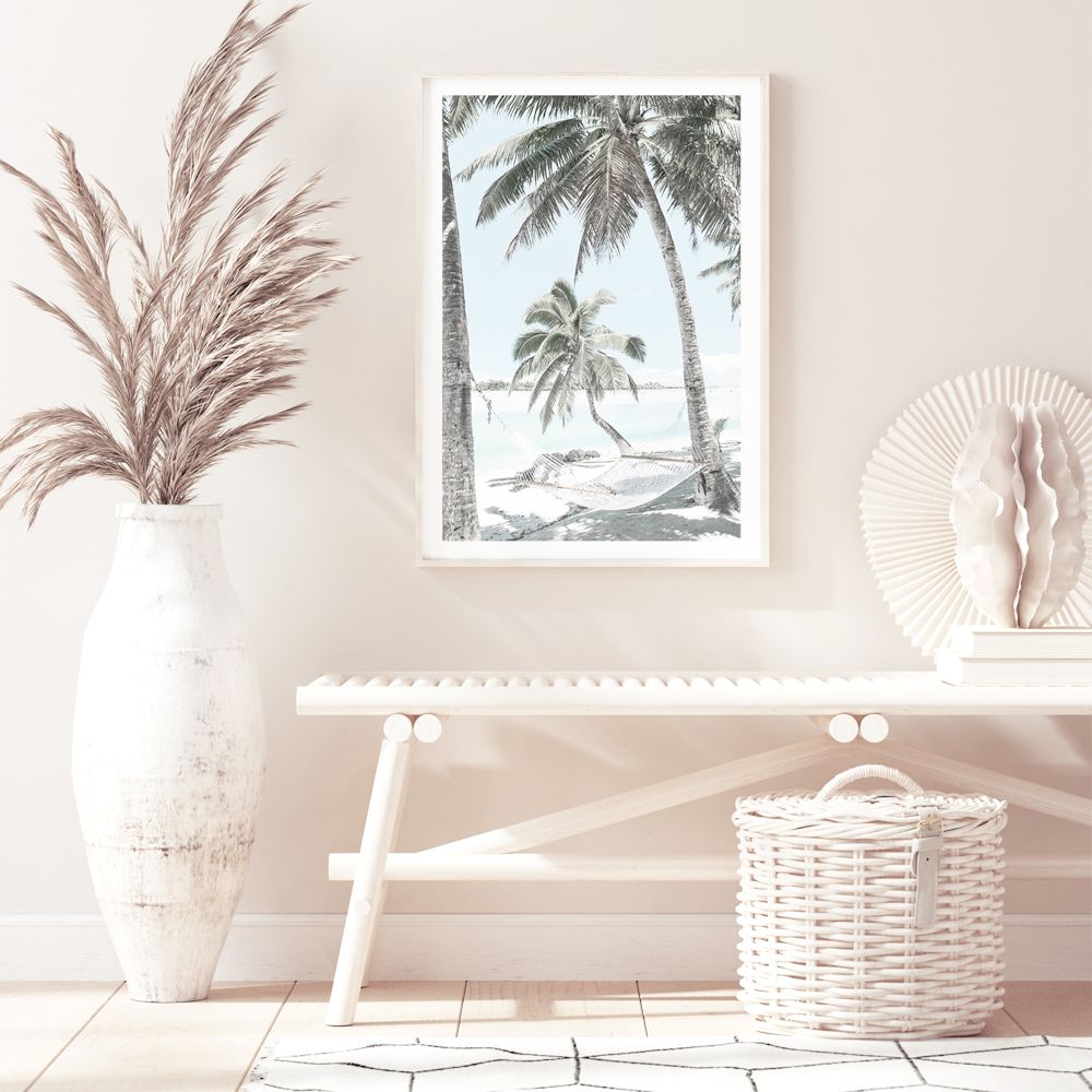 A relaxing view of a hammock between two palm trees on a tropical beach in this gorgeous artwork in print or canvas. 