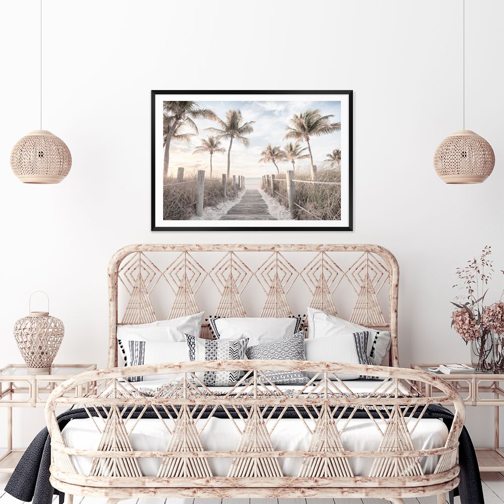 A framed or unframed Hamptons art print of Florida Keys with a path to the beach framed by palm trees. 