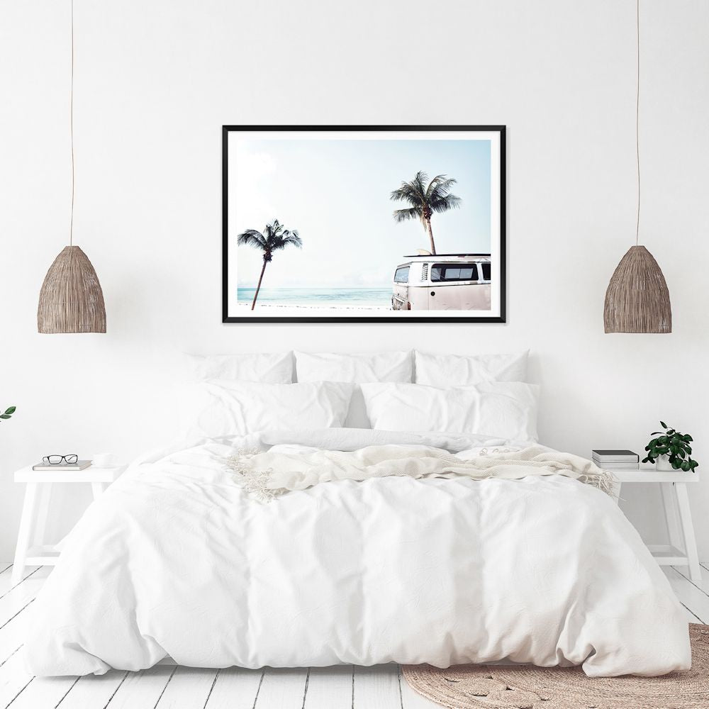 Featuring an iconic blue Kombi van at the beach with palm trees available in a canvas or photo wall art print.