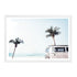 A wall art print featuring an iconic blue Kombi van at the beach with palm trees, in canvas or photo print.