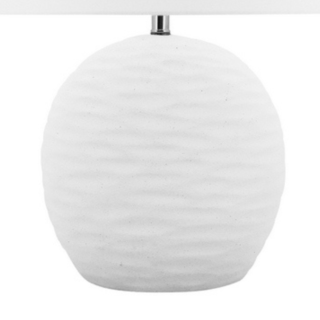 White Round Kima Table with a textured wavy base and white lamp shade measuring 54cm tall perfect for your coastal home decor.