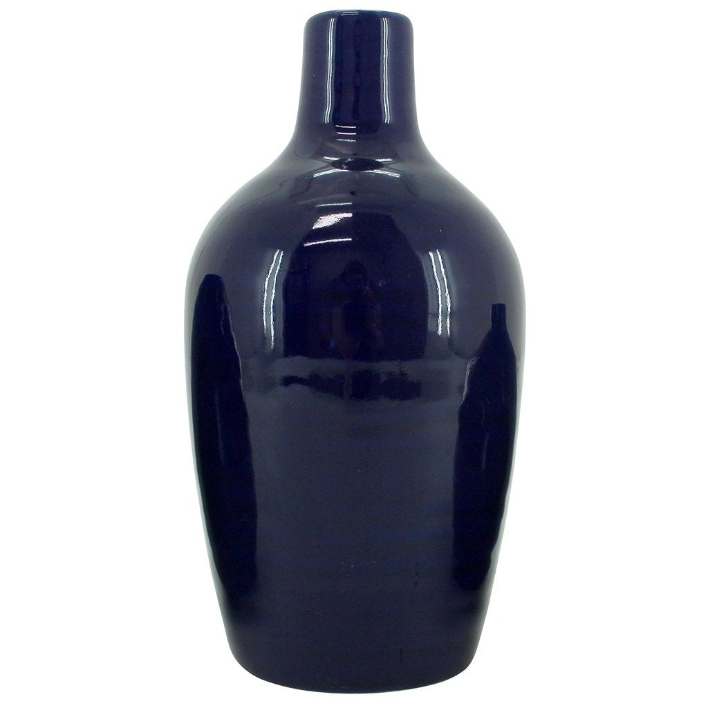 A Large Bud Vase in Indigo. With a smooth ceramic finish this stylish home decor vase will compliment your living space.