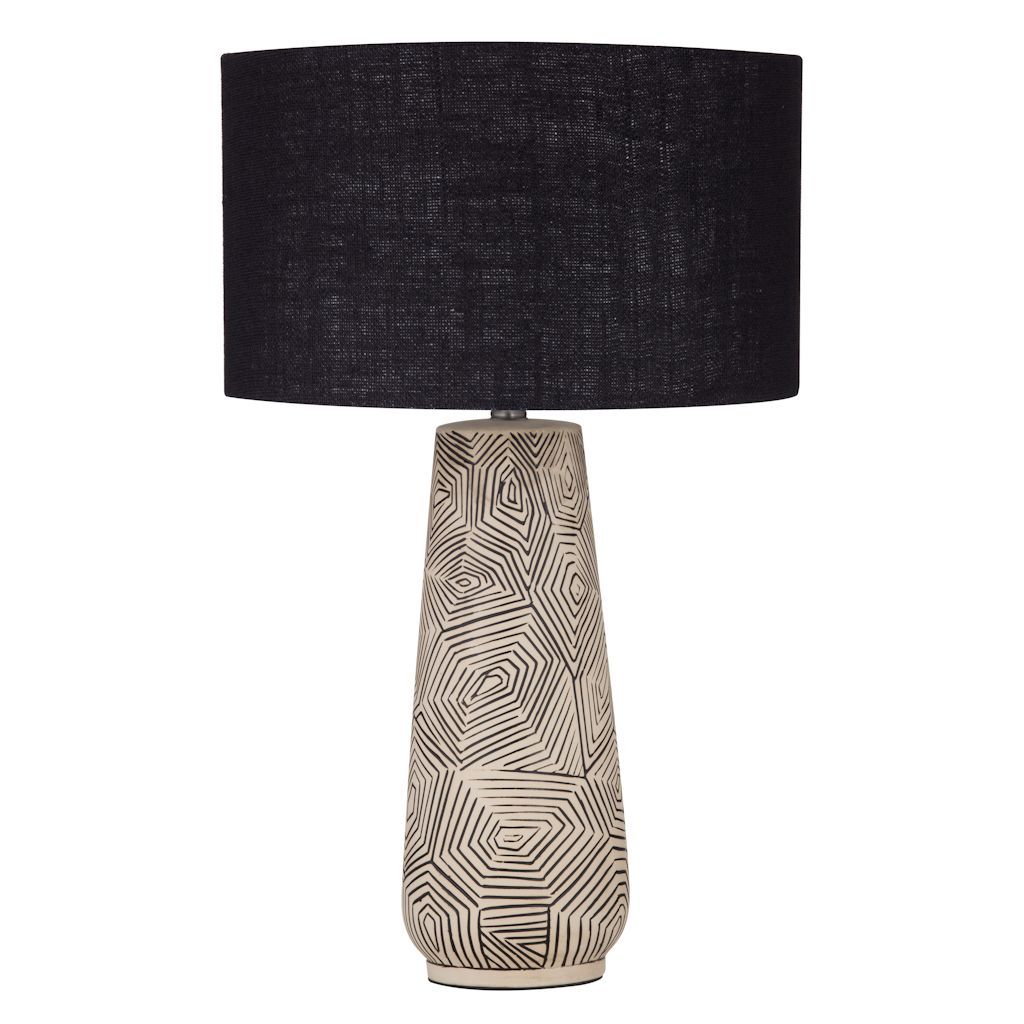 The Caritas Table Lamp is a stylish statement piece of home decor. The ceramic base has a black and cream linear design is completed with a black shade.