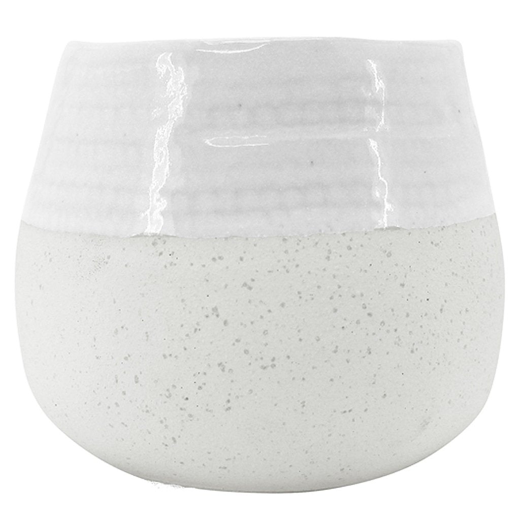 A large round ceramic Diggle plant pot with 2 different textures beautifully suited to natural, coastal home decor styling ideas and themes.