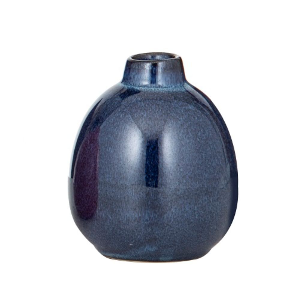 A small Nya Vessel Vase in blue to decorate your home. Style togther with other colors to complete your home decor.