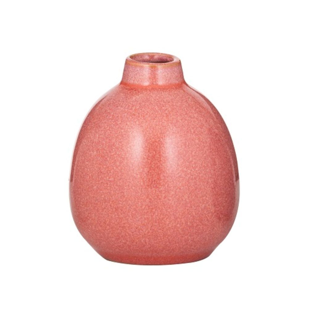 A small Nya Vessel Vase in pink to decorate your home. Style togther with other colors to complete your home decor.