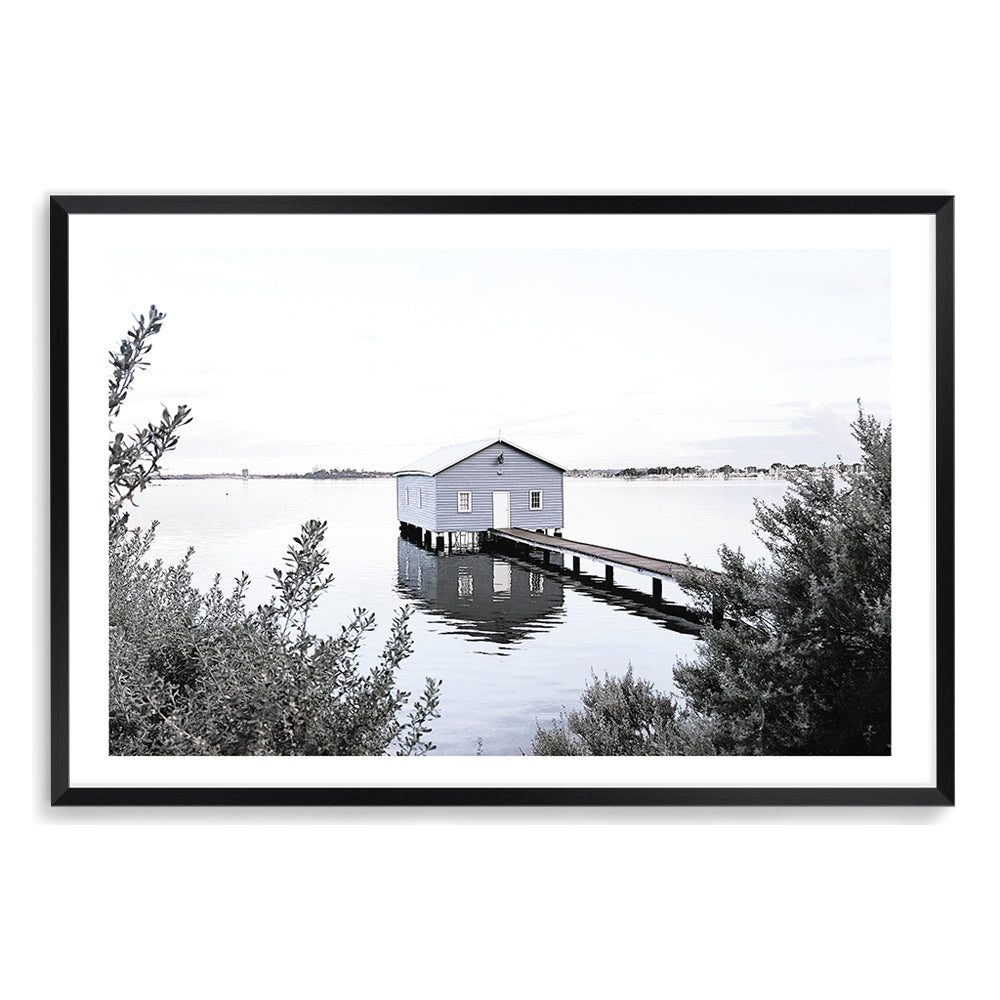 A wall art print of a blue boat shed in Perth Australia, available in an unframed or framed poster print and stretched canvas.