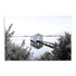 A stretched canvas wall art print featuring a lake and blue boat shed in Perth Australia, available unframed or with a timber, white or black frame.