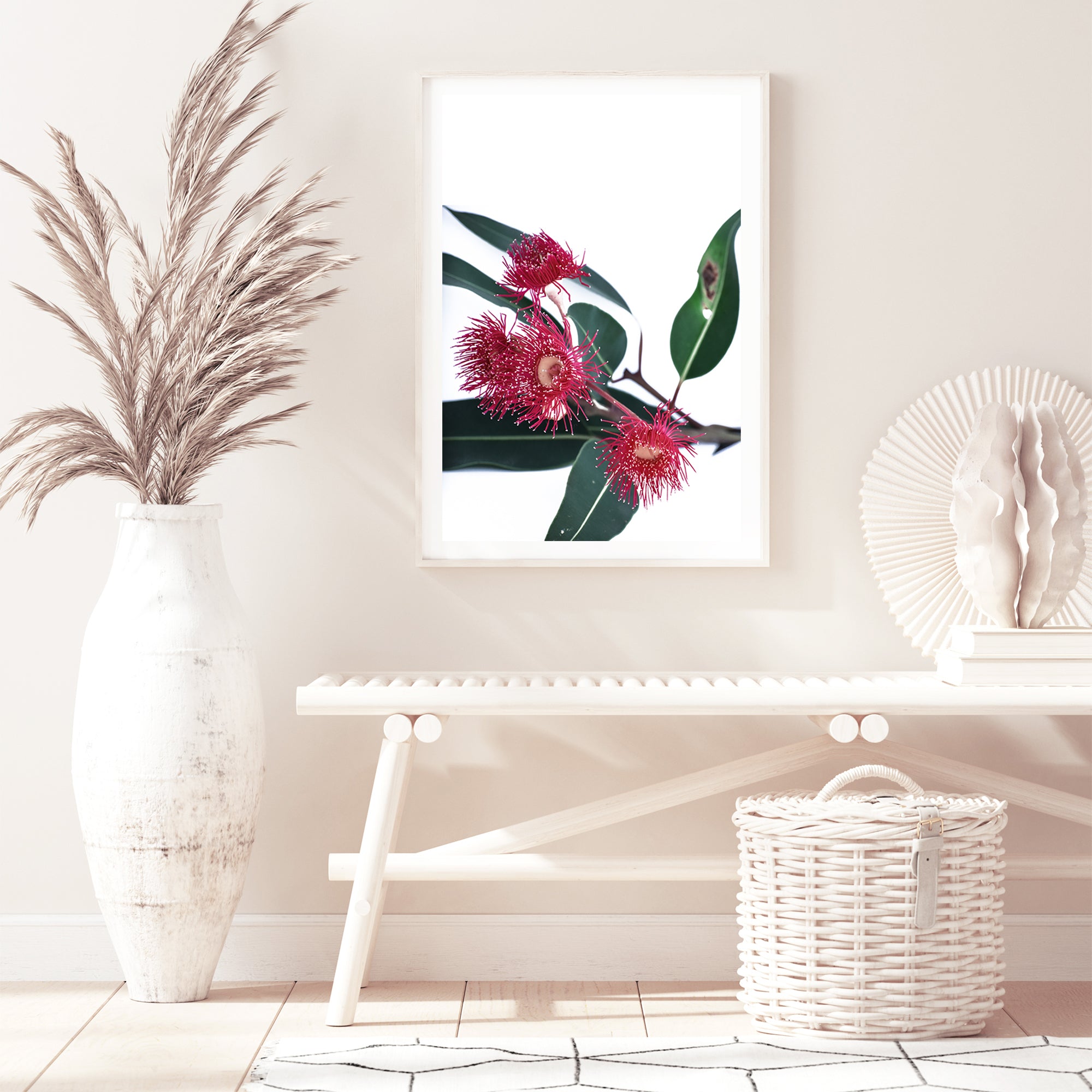 A photo floral wall art featuring beautiful red wild flowers A and green eucalyptus leaves, available framed or unframed.