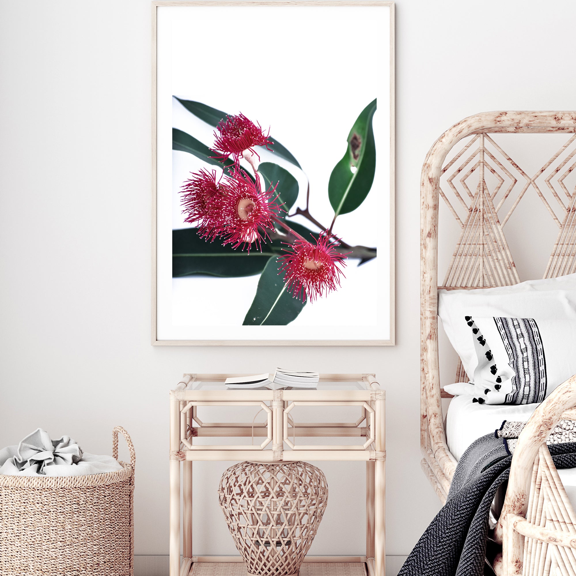 A beautiful floral wall art featuring red wild flowers A and green eucalyptus leaves, available in canvas and art prints.