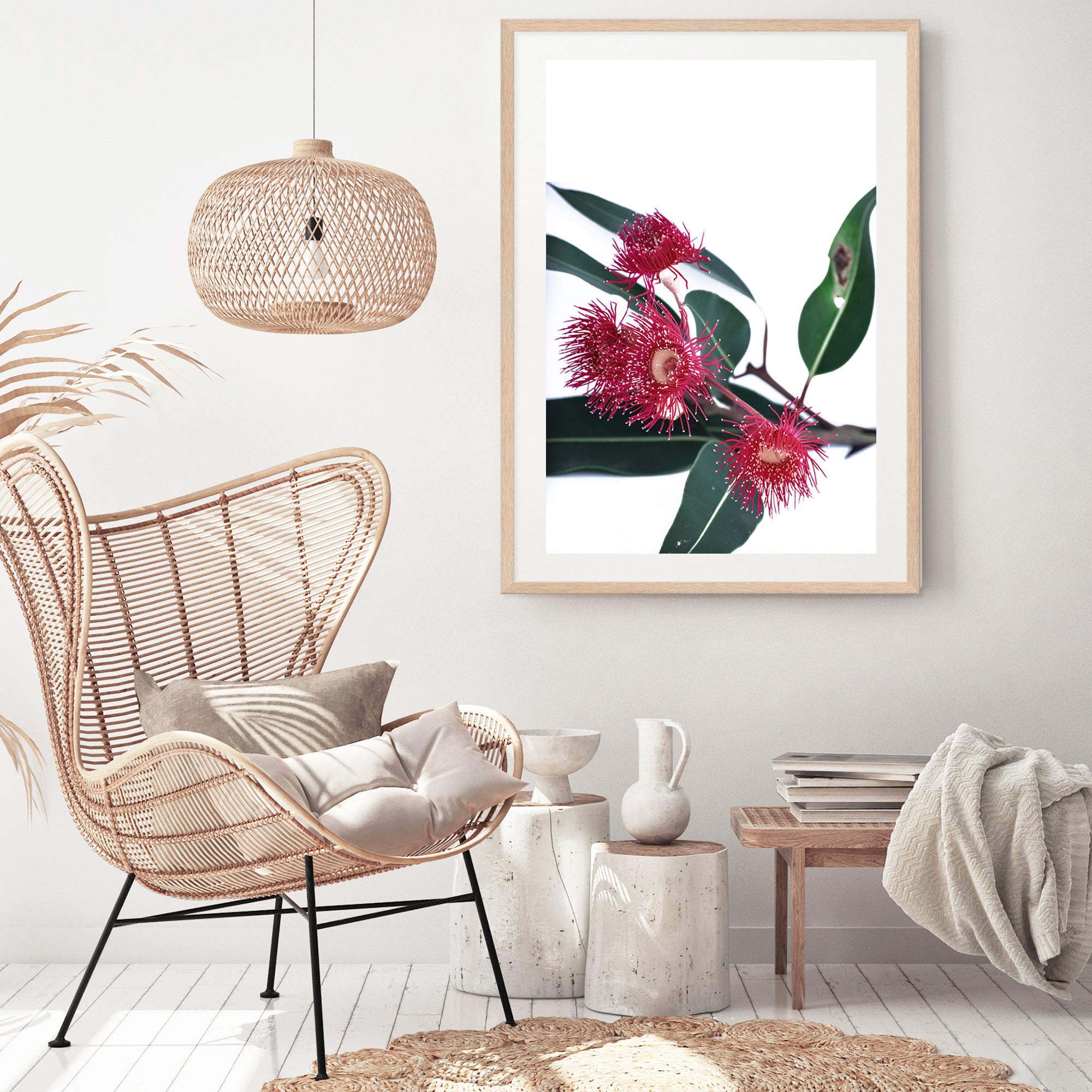 A floral photographic artwork in canvas featuring beautiful red wild flowers A and green eucalyptus leaves, available framed or unframed.