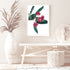 This floral wall art print featuring green eucalyptus leaves highlighting beautiful red wild flowers is available in canvas and photo prints.