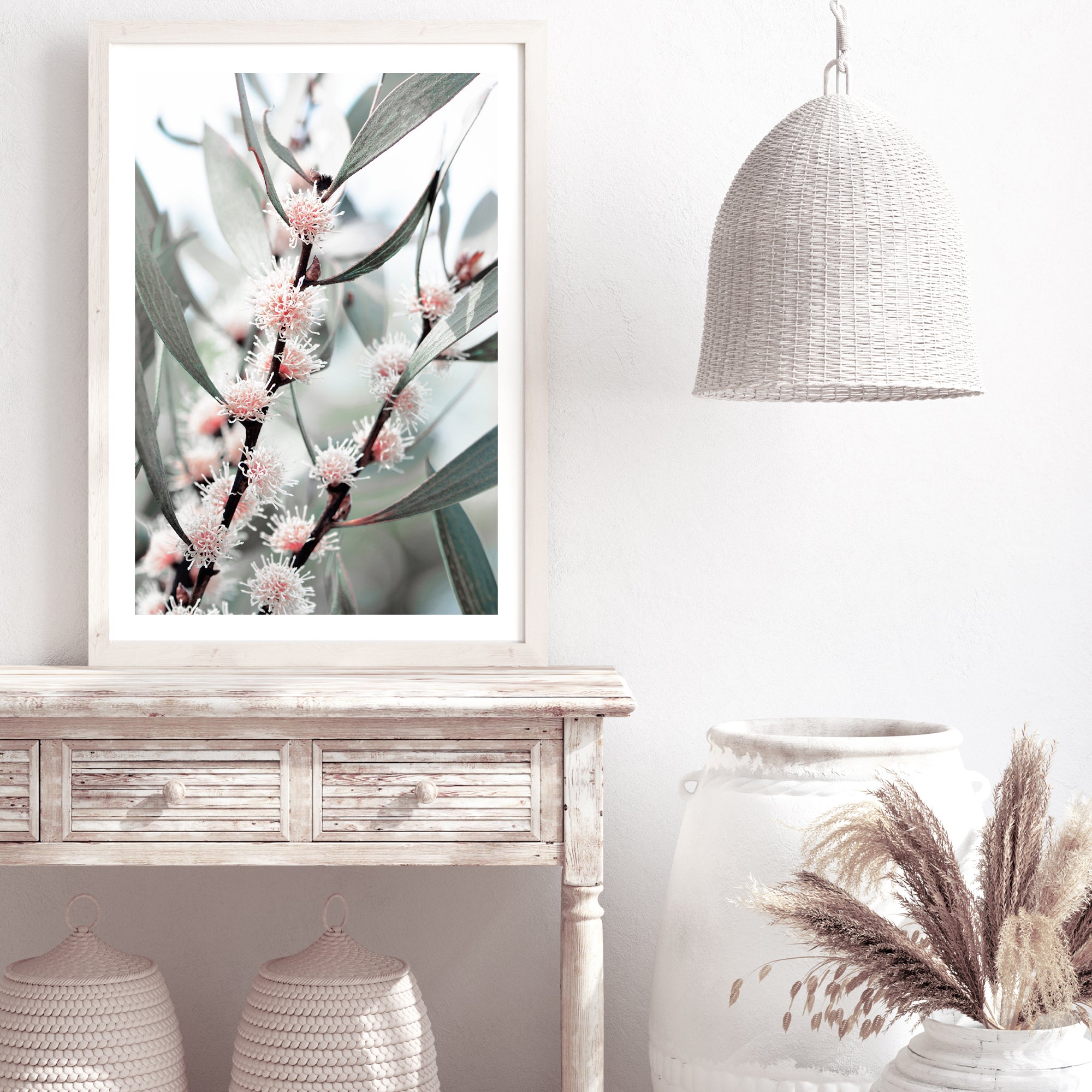An artwork of eucalytpus pink wild flowers and green leaves with branches in the background on canvas or photo wall art print.  