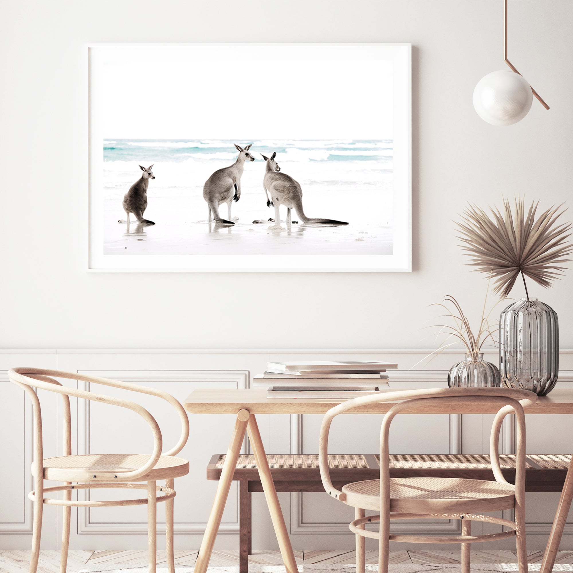 Stretched canvas artwork featuring three kangaroos enjoying some time on the beach, available framed or unframed. 