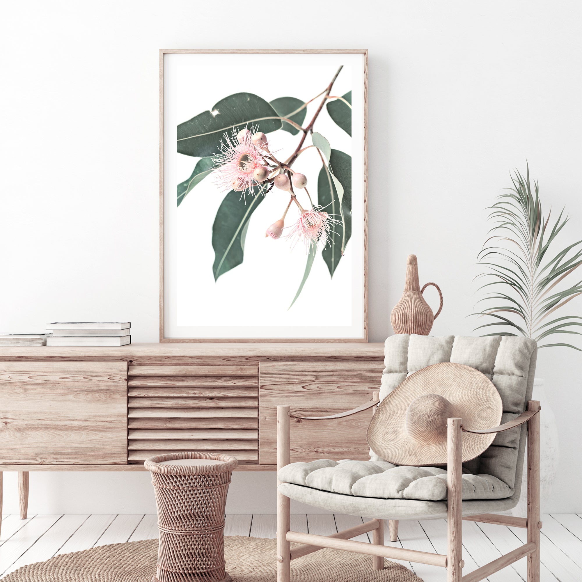 An Australian artwork of pink eucalyptus wild flowers and green leaves with a neutral background, available framed or unframed  of a native gum eucalyptus flower a wall art.