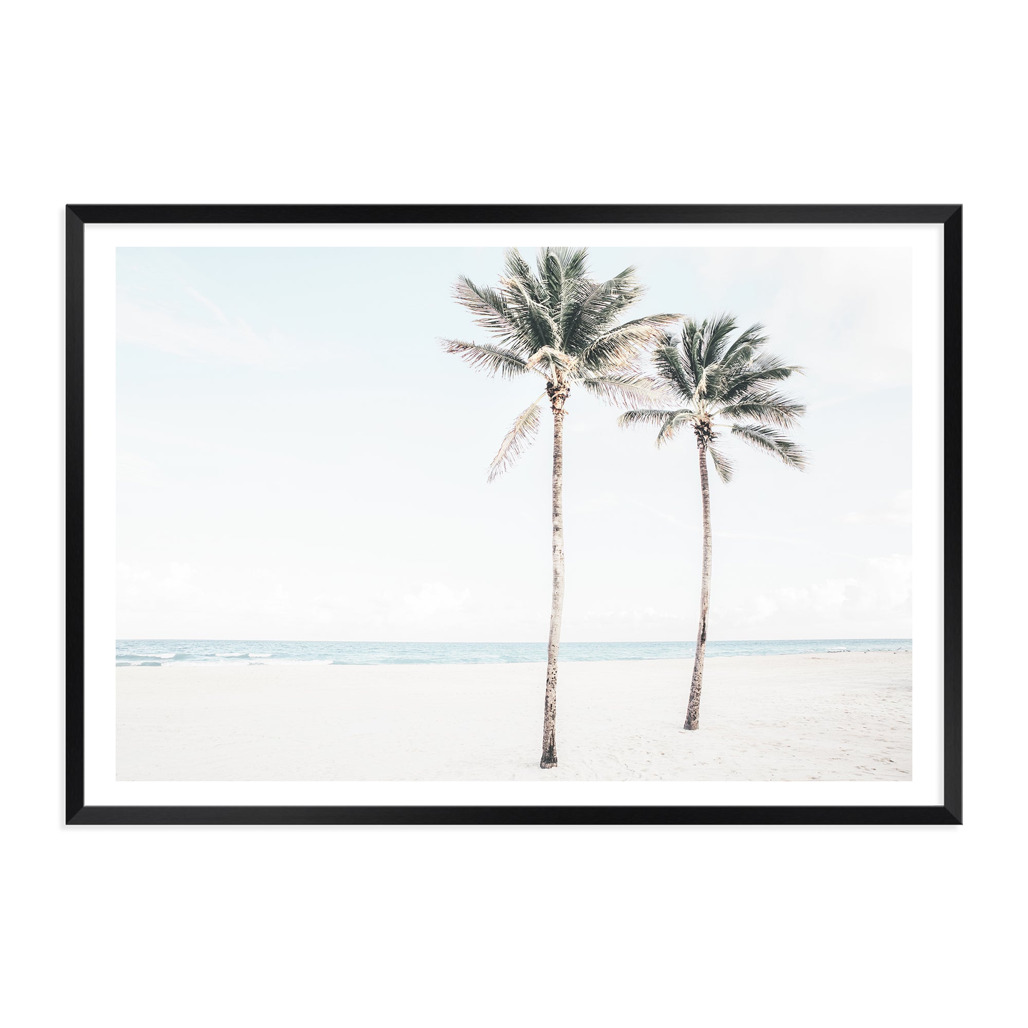 A coastal artwork of  two palm trees and the beach, available in print and canvas. 