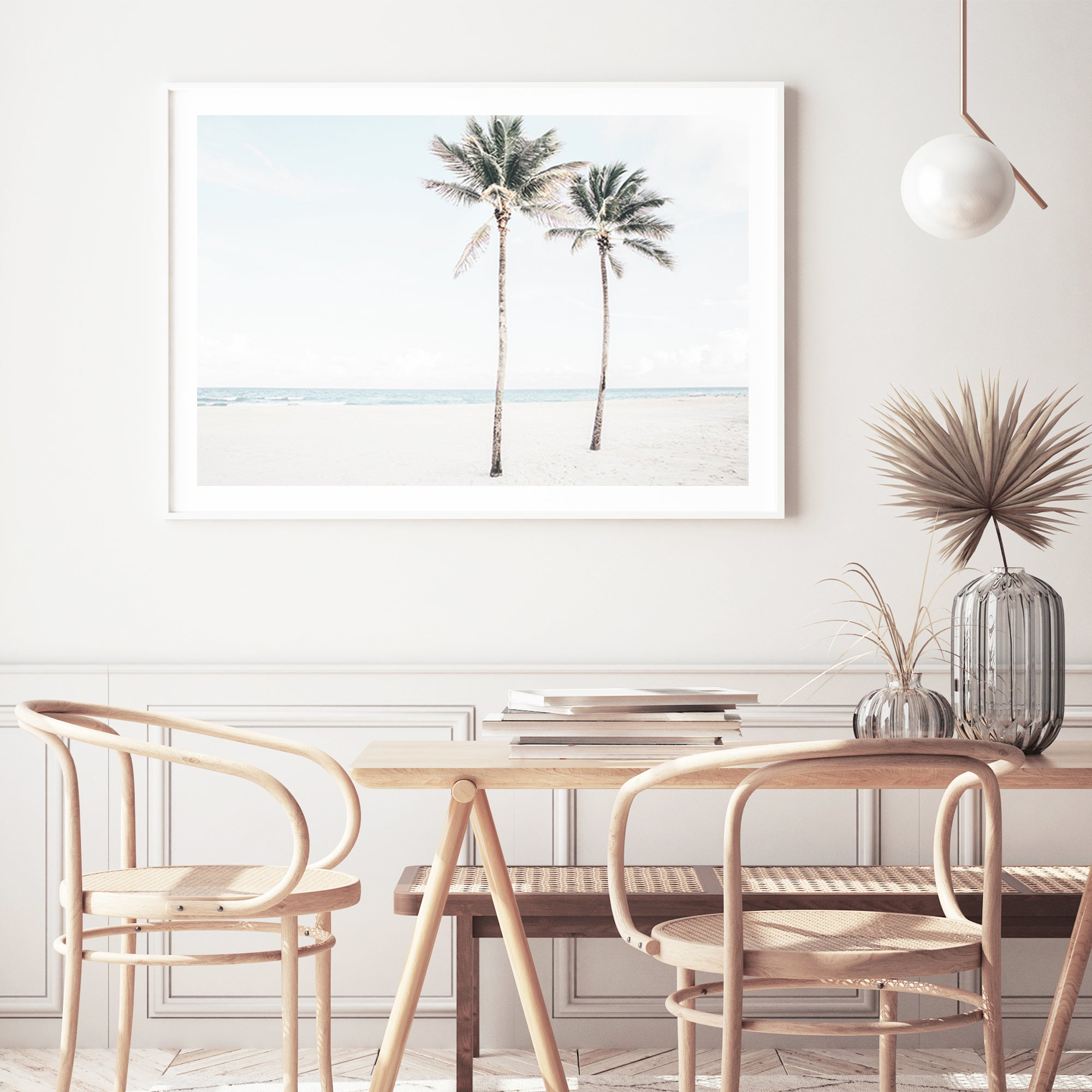 A Hamptons artwork of  the beach and two palm trees, available in print and canvas. 