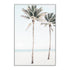 A stretched canvas Hamptons artwork of two palm trees, blue skies and the beach, available unframed or timber, black or white frames.