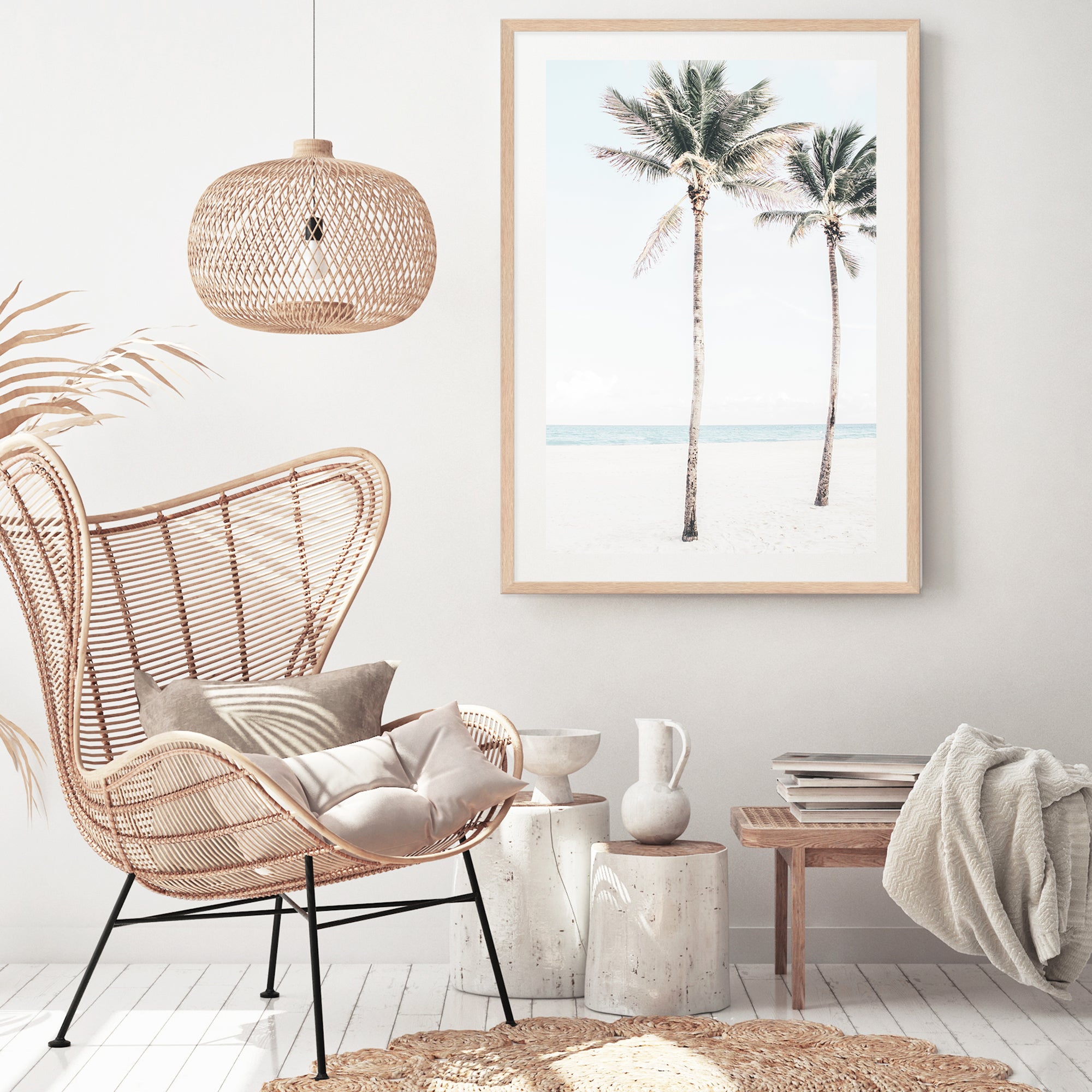 A Hamptons  artwork of blue skies, two palm trees and the beach, available in print and canvas. 