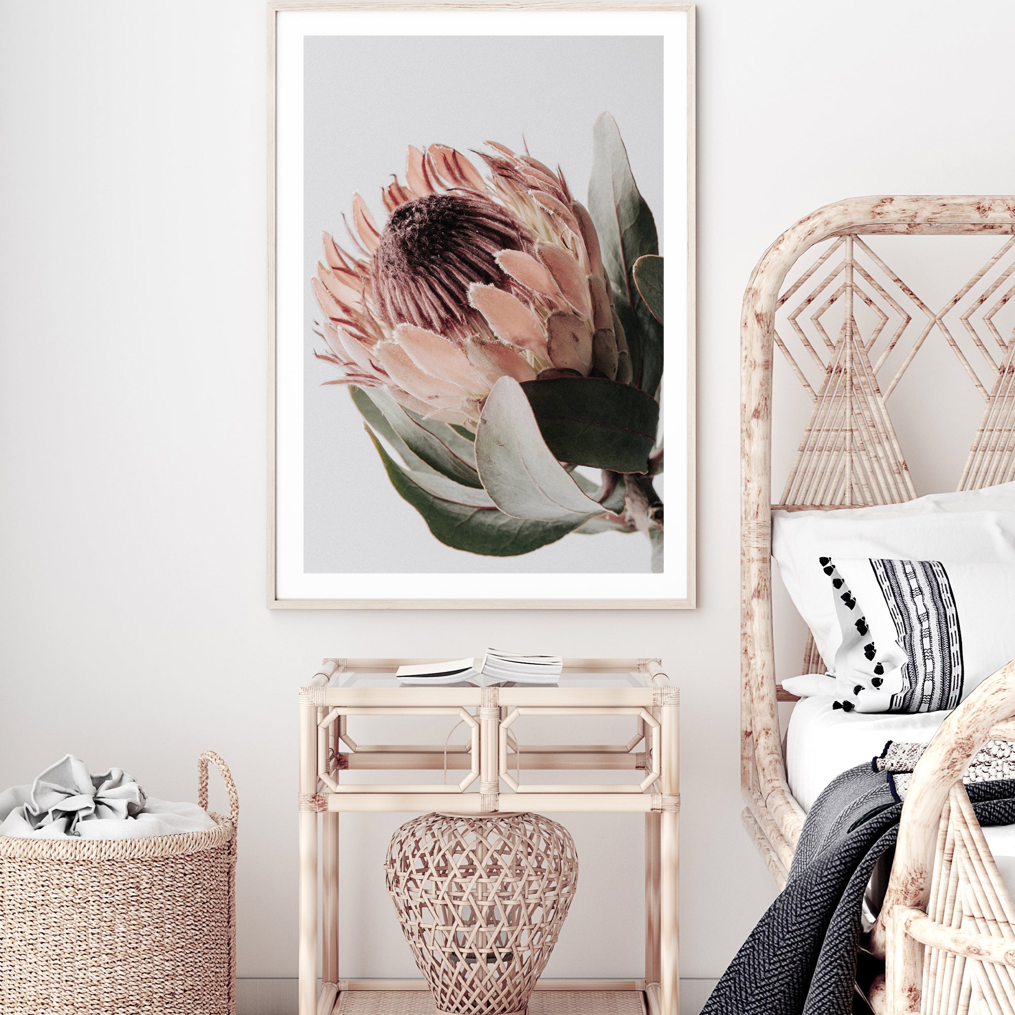 One beautiful peach protea flower with green leaves in muted tones are the focal point of  this floral art print. 