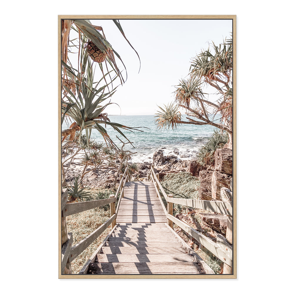 An artwork showing stairs to the beach lined by trees , available in timber, black or white frames or unframed.